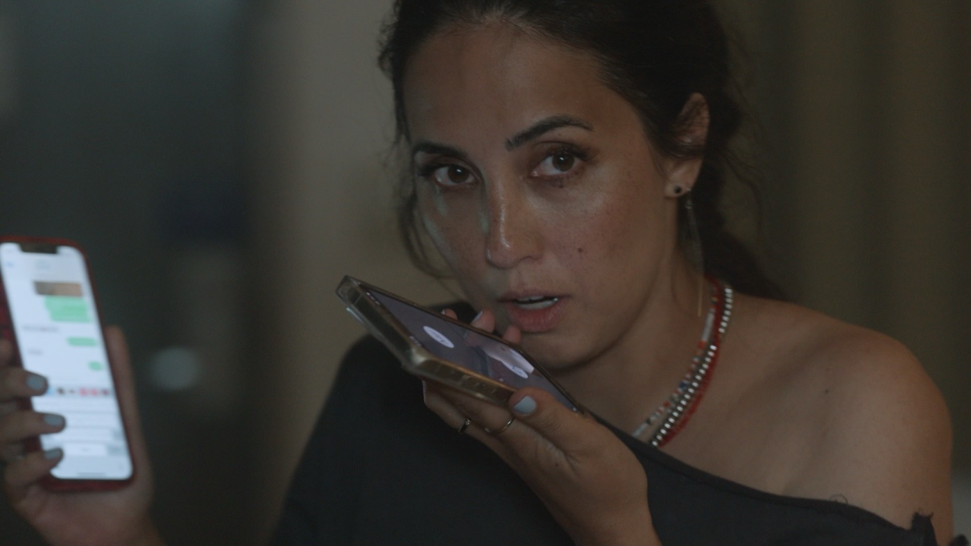 Roo Powell working a case during an undercover operation